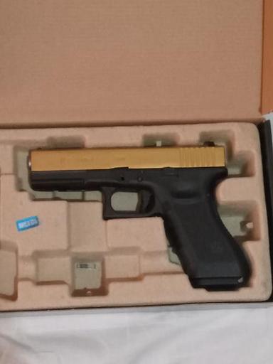 We Glock 17 titanium Gold Airsoft 